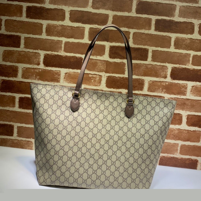 G*u*i shopping bags